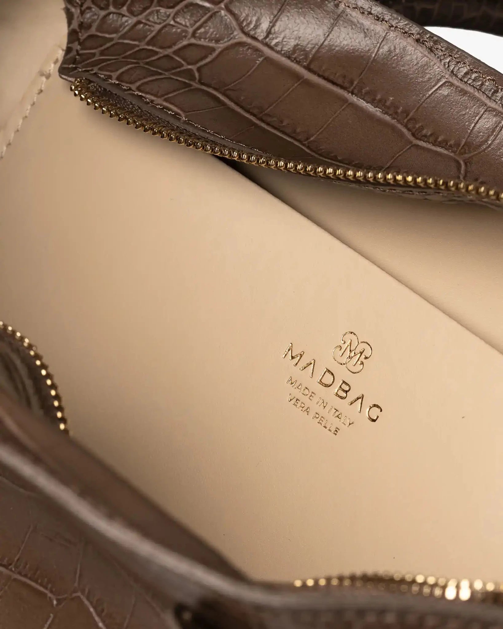 Interno borsa Bassotto Croc taupe con scomparti e dettagli