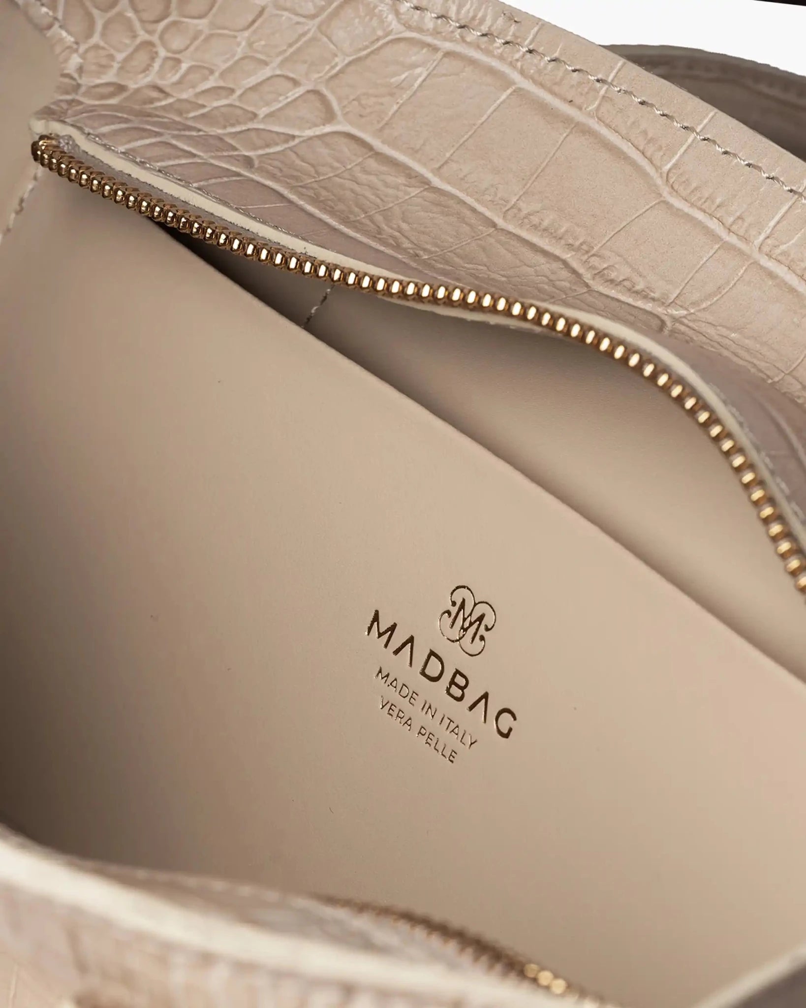 Interno borsa Bassotto Croc beige con scomparti e dettagli