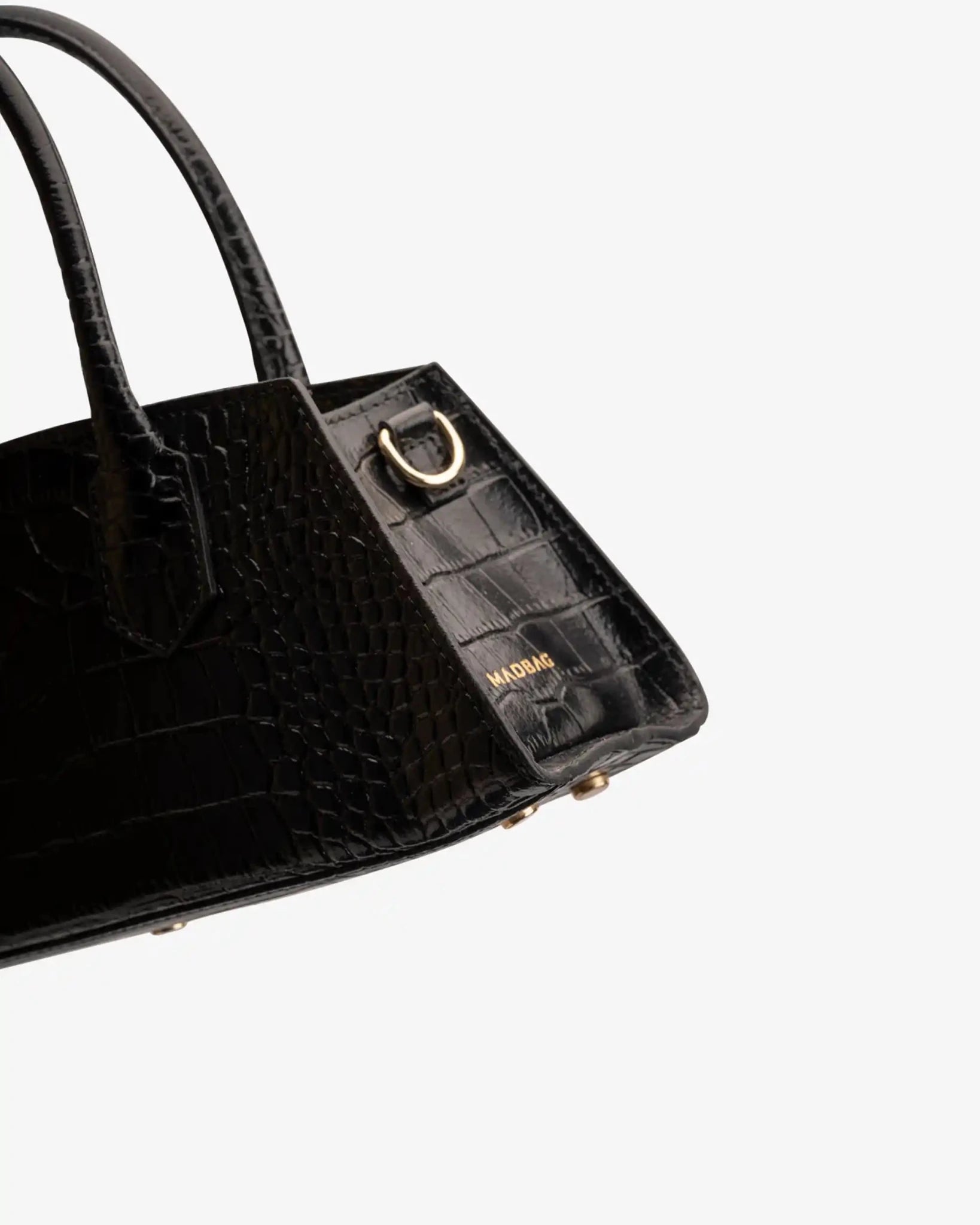 Dettaglio laterale borsa Small Bassotto Croc nera con finitura effetto coccodrillo