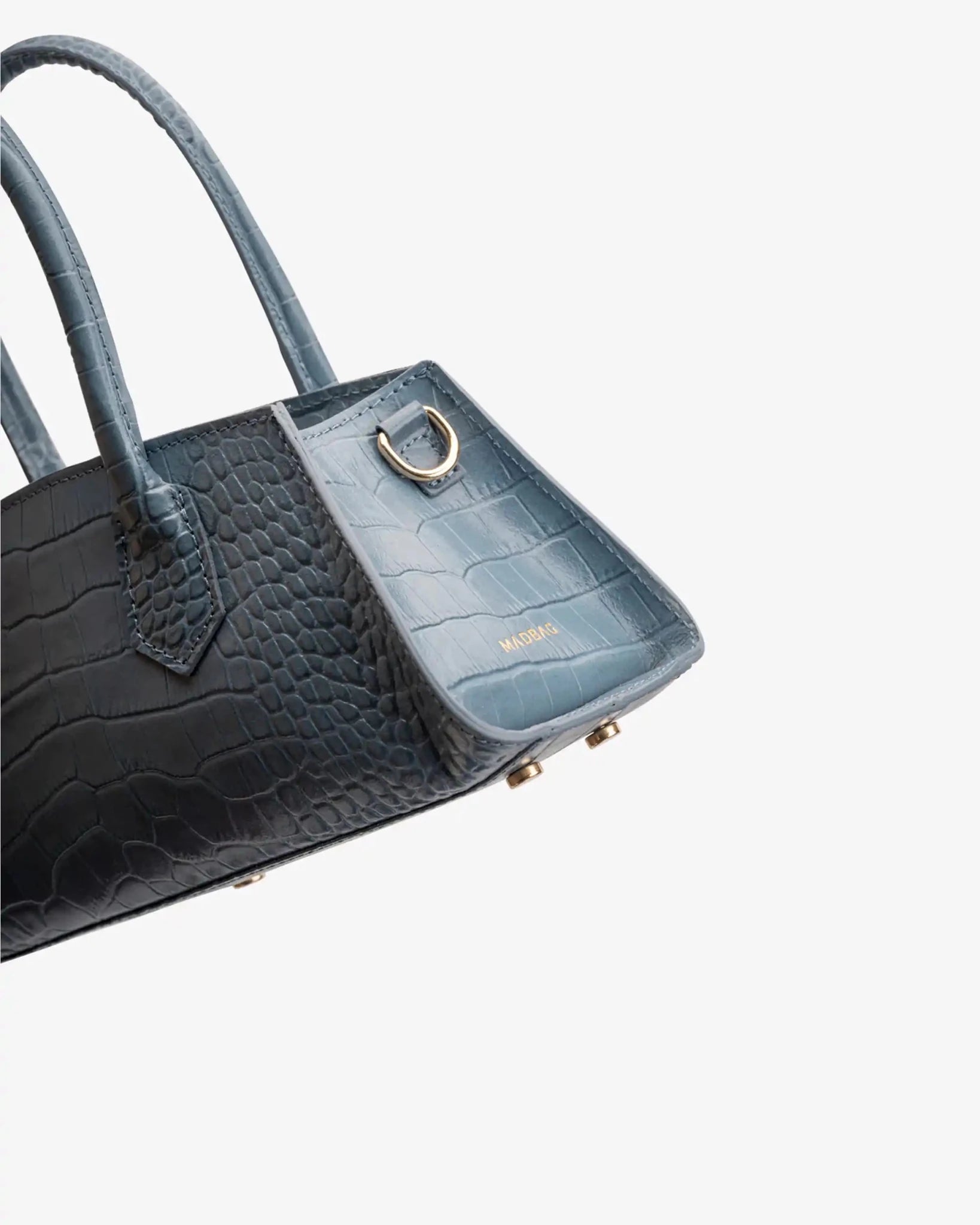 Dettaglio laterale borsa Small Bassotto Croc blu con finitura effetto coccodrillo