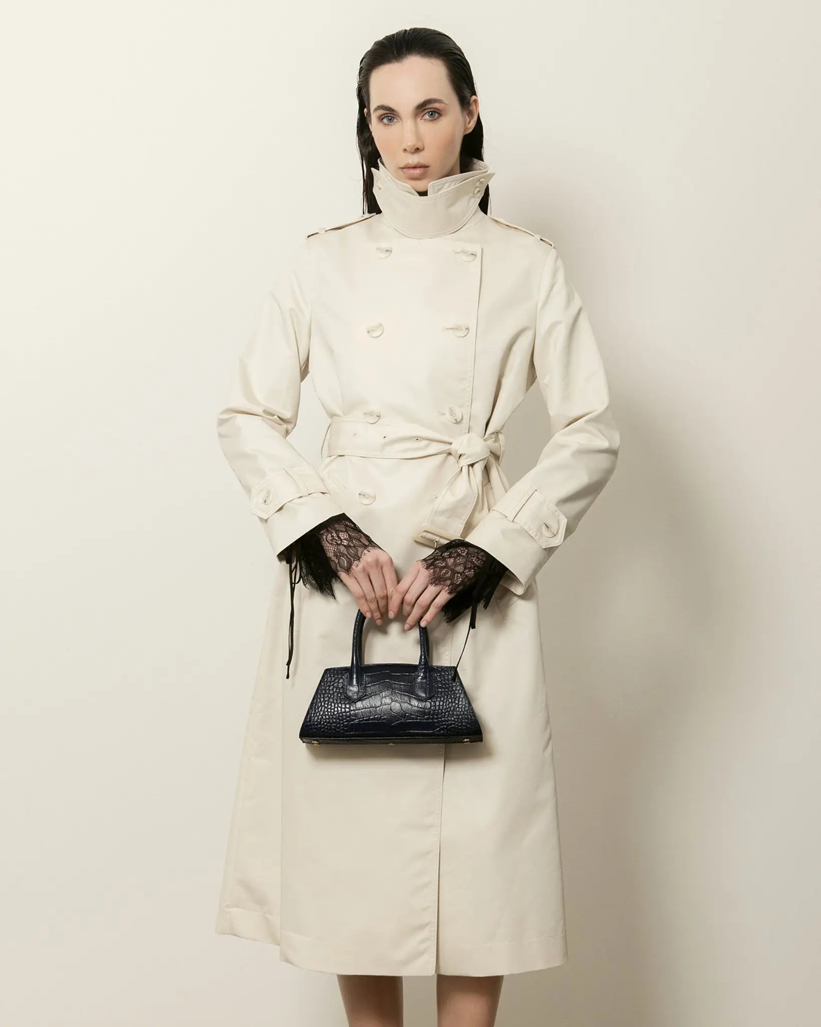 MADBAG Small Bassotto leather blue croc handbag front view worn by model