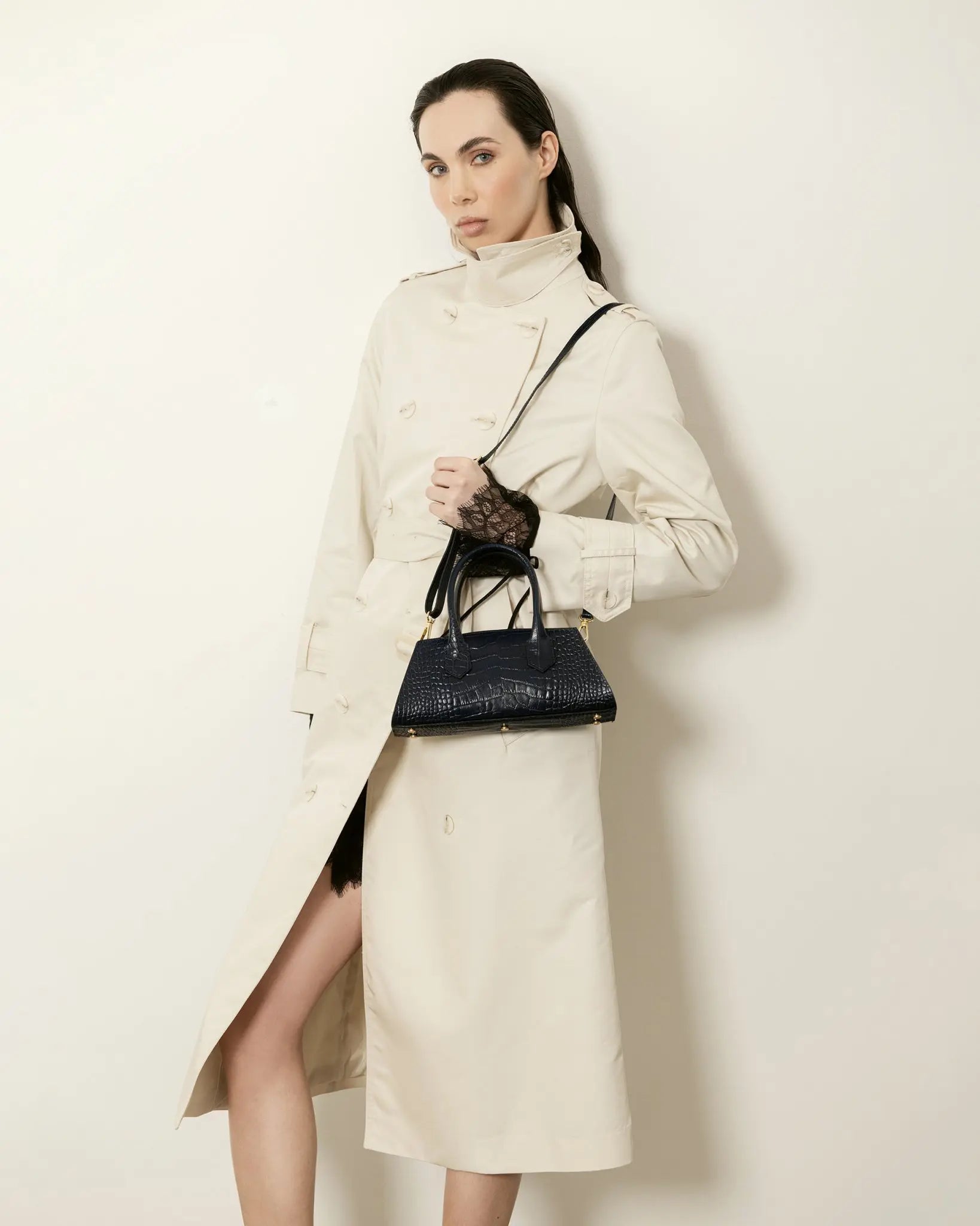 MADBAG Small Bassotto blue croc leather bag with shoulder strap worn by model